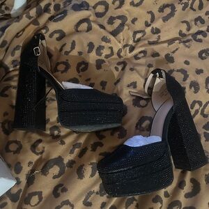 Black sequin platform heels